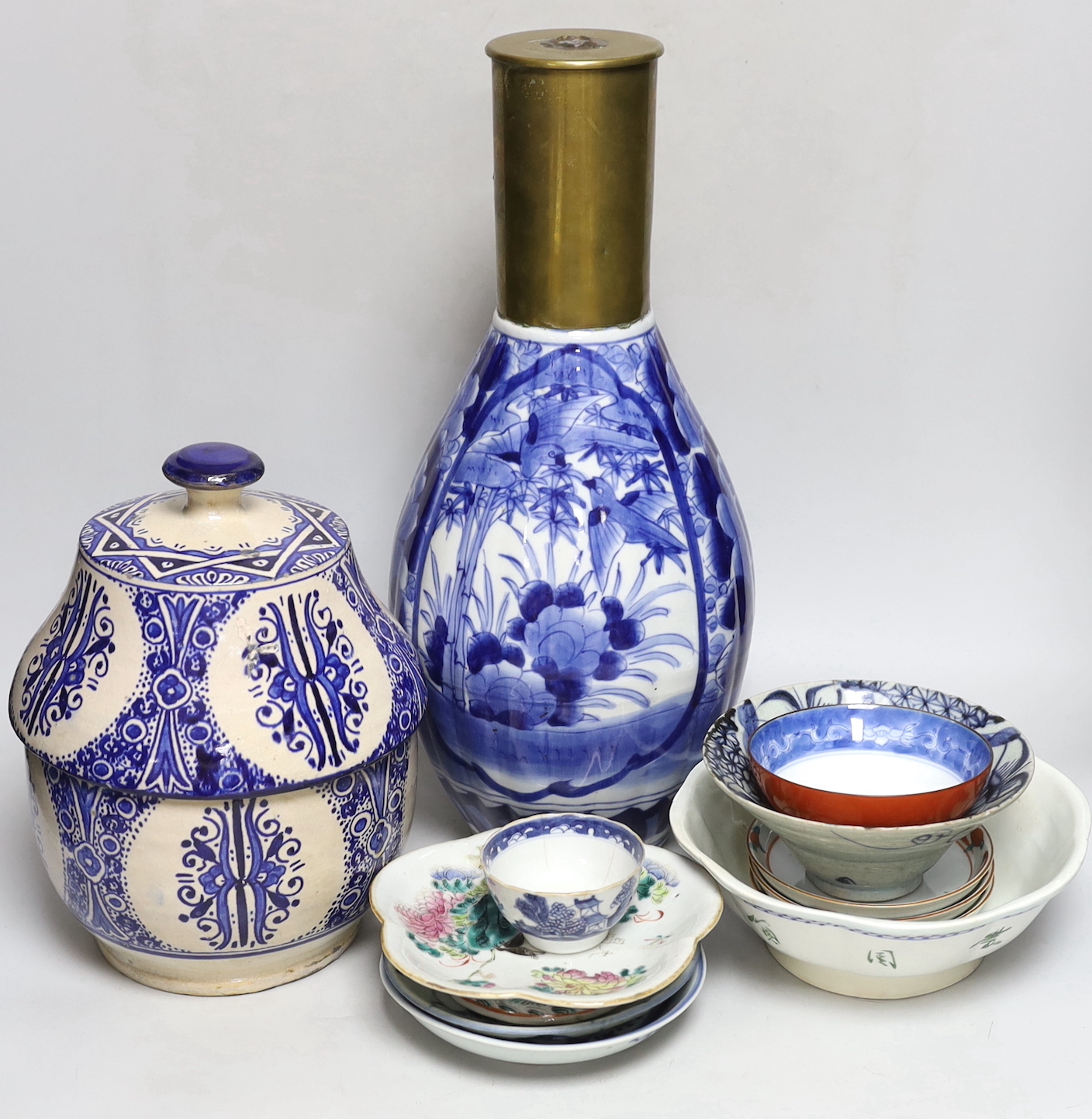 A quantity of Chinese and Japanese ceramics, tallest 43cm high